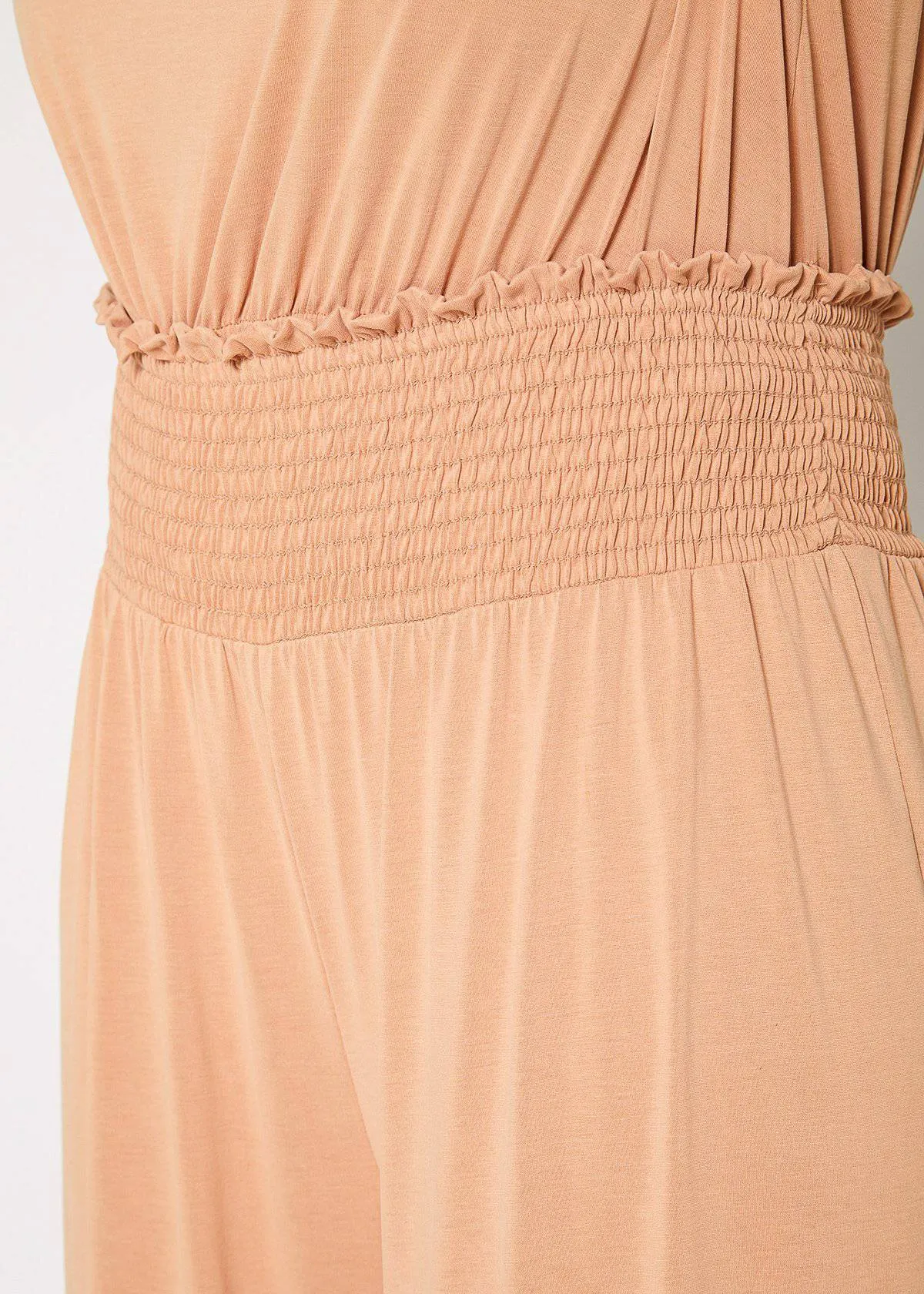 Plus Size Smocked Waist Wide Leg Palazzo Pants in Apricot by Shop at Konus