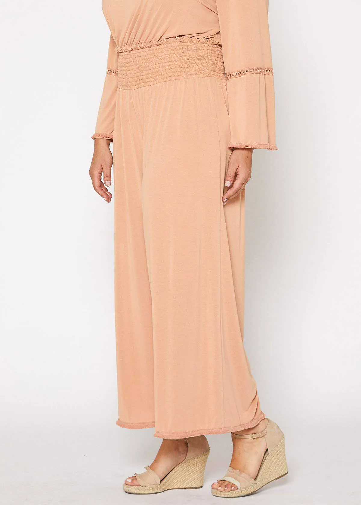 Plus Size Smocked Waist Wide Leg Palazzo Pants in Apricot by Shop at Konus